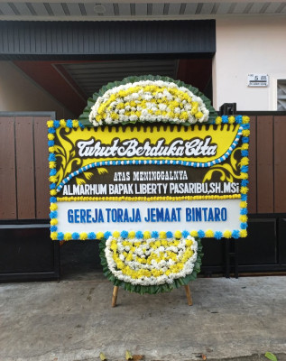 Papan Bunga Duka di Batu Merah